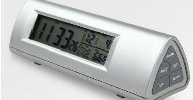 Portable digital clock with LED torch